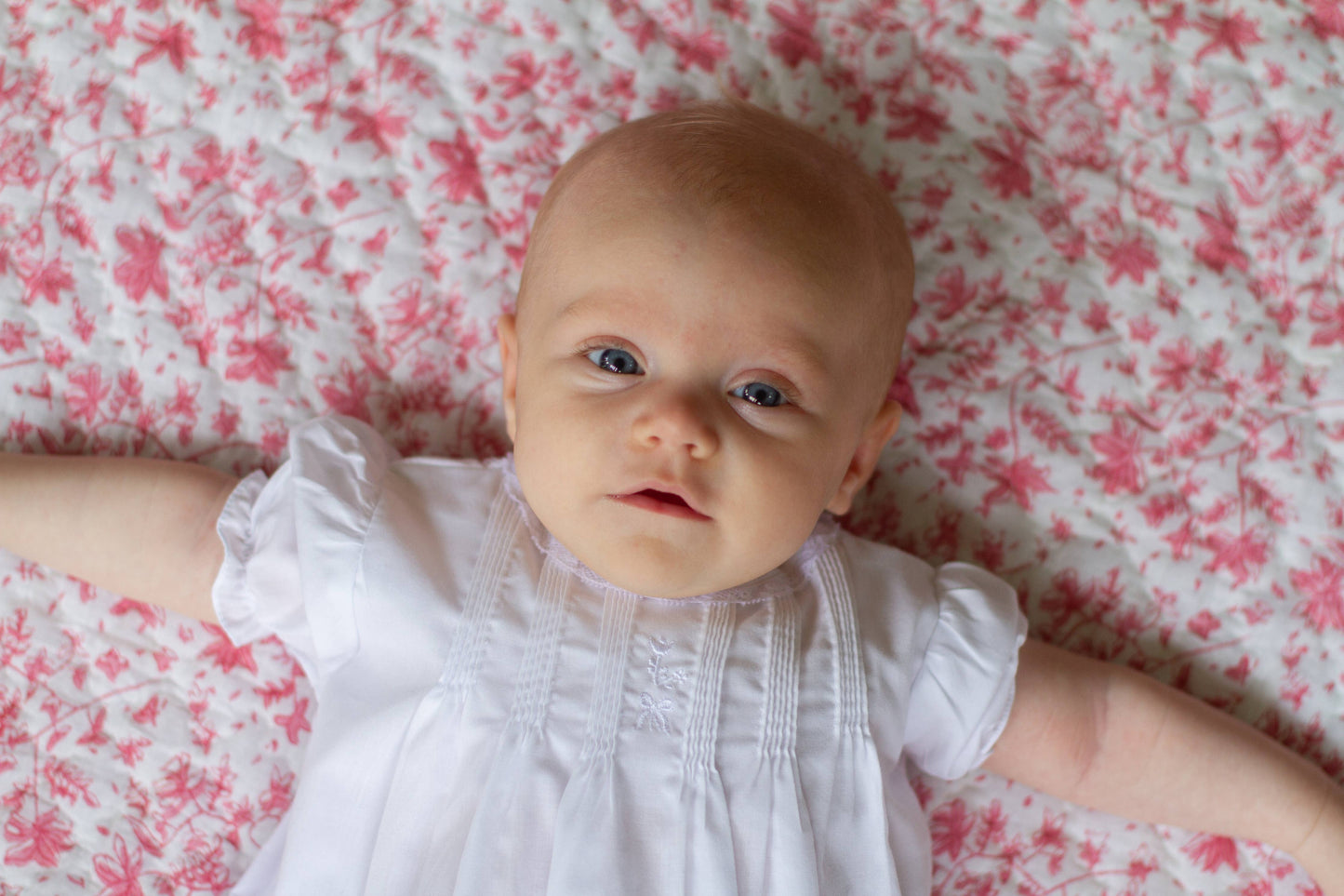 REVERSIBLE BABY QUILT PINK