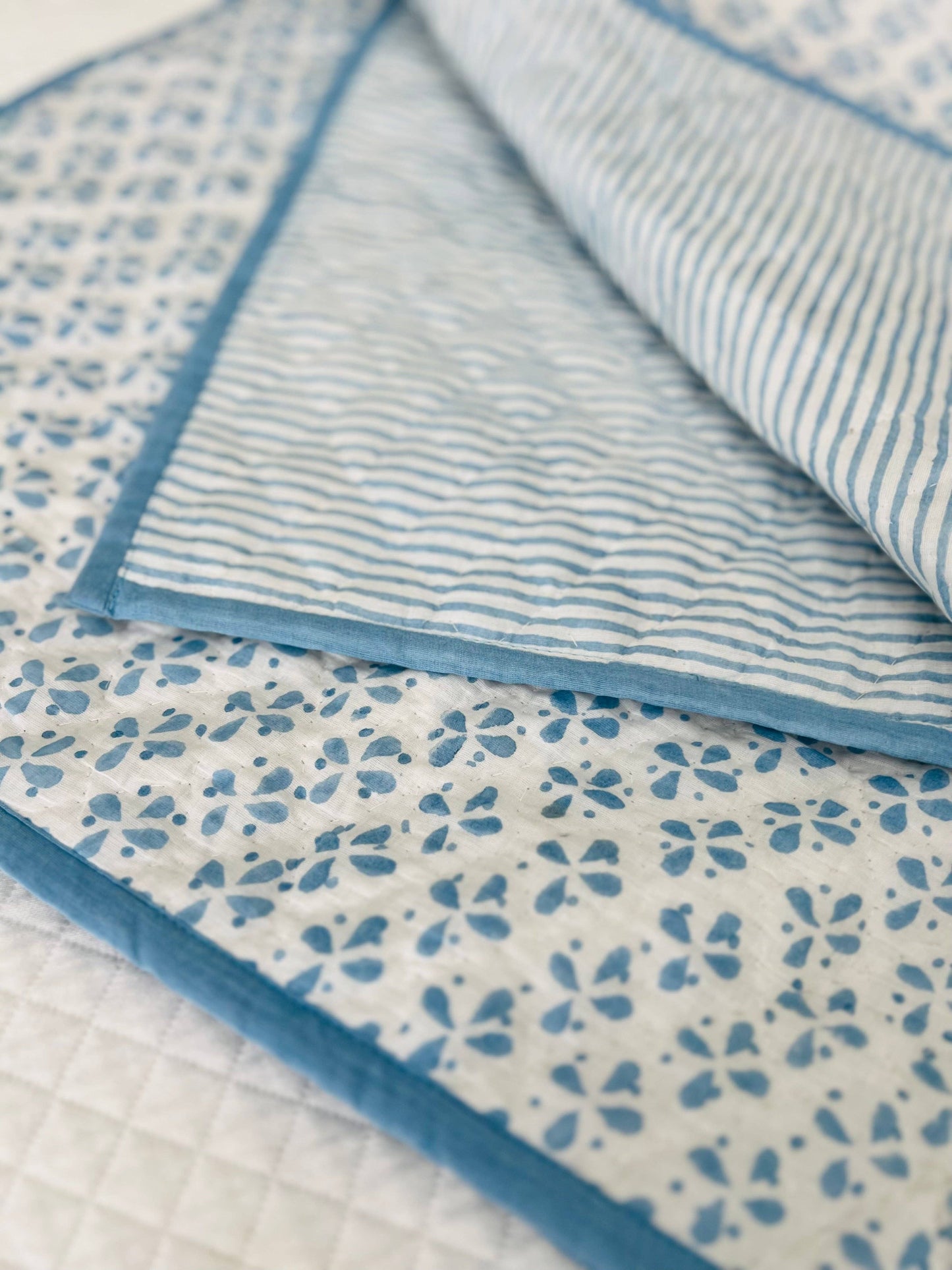 REVERSIBLE BABY QUILT BLUE