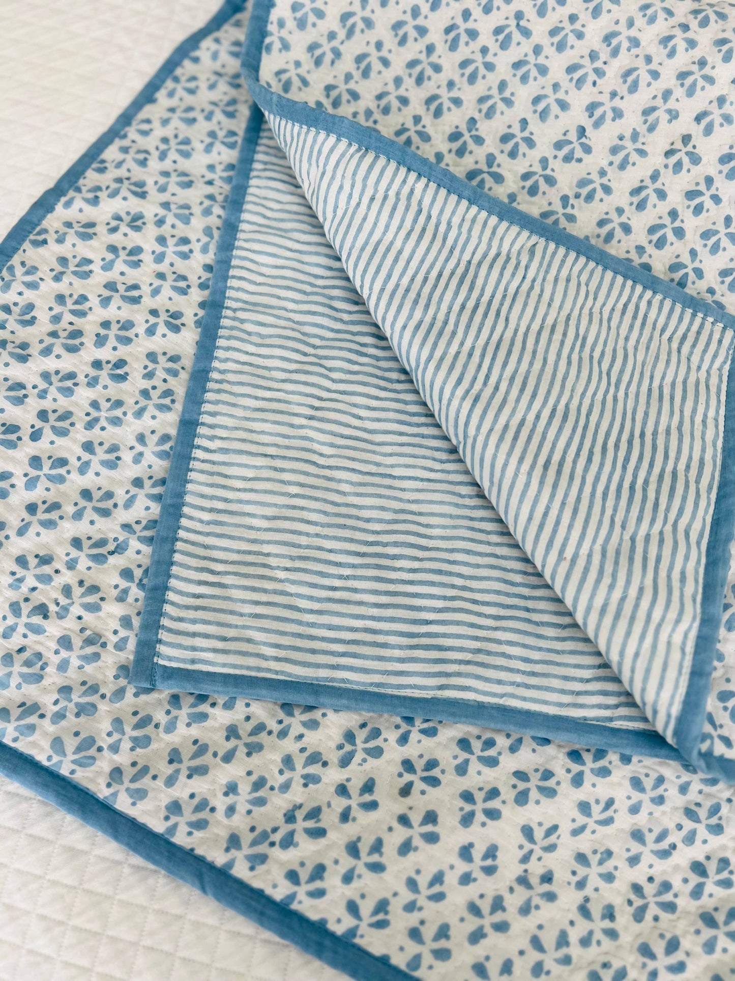 REVERSIBLE BABY QUILT BLUE