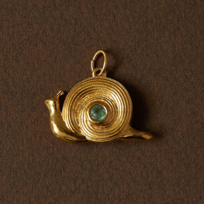 PERIDOT SNAIL CHARM CORD NECKLACE